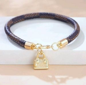 Chic Gold and Brown Bracelet with Handbag Charm